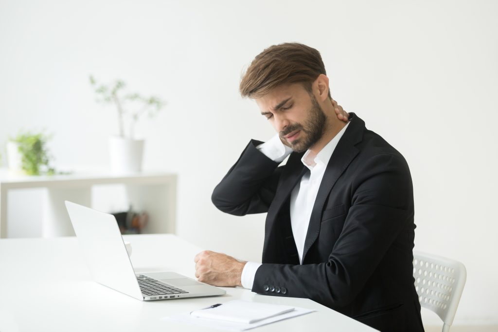 Young,Businessman,In,Suit,Feels,Neck,Pain,Massaging,Tensed,Muscles