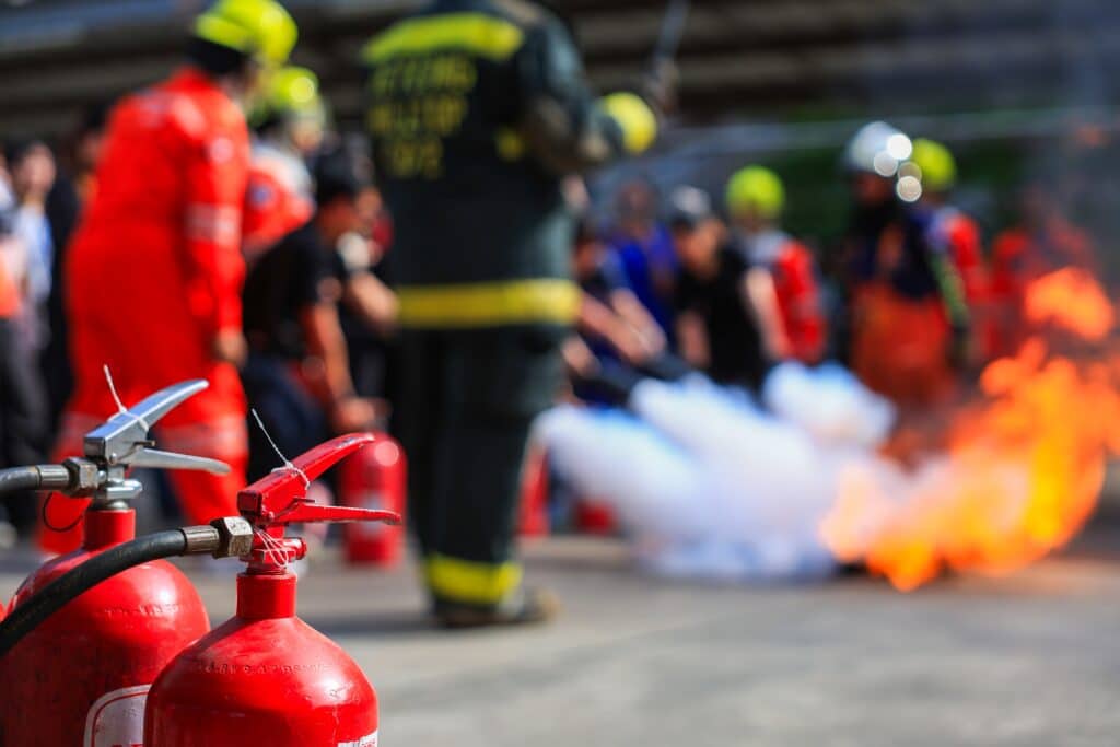 Company,Employees,Are,Undergoing,Basic,Fire,Extinguishing,Training,,Fire,Extinguisher