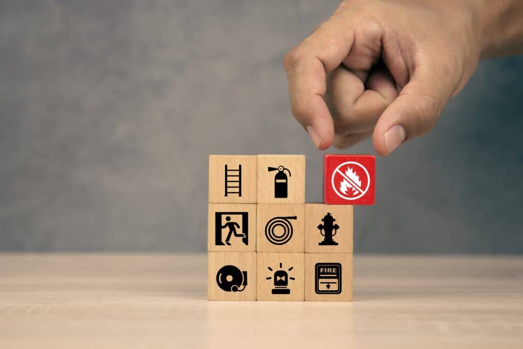 Hand,Choose,Cube,Wooden,Block,Stack,With,Fire,Prevent,Icon